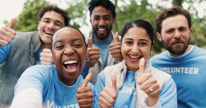 Portrait selfie, thumbs up and volunteer people outdoor for food drive celebration or success. Donation, photograph and support with excited friends in park together for charity or community outreach