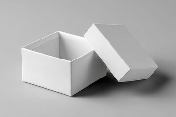 white open box with lid on grey background