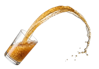 Dynamic splash of golden liquid pouring from a clear glass.