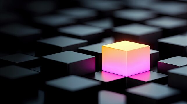 A single illuminated cube glows with vibrant pink and orange hues, standing out from a dark grid of identical cubes.