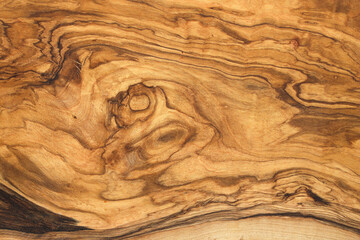 Close up shot of olive wood texture pattern with natural detail structure