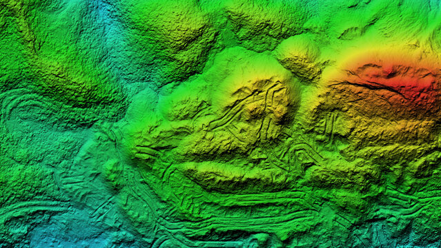 A colorful image of a rocky mountain with a green and red gradient. The image has a sense of depth and texture, with the colors blending together to create a dynamic and interesting scene