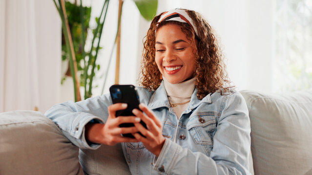 Reading, smartphone and happy woman in home on sofa for blog post, social media profile and news. Mobile, relax and person in living room for communication with contact, notification and online chat - Powered by Adobe