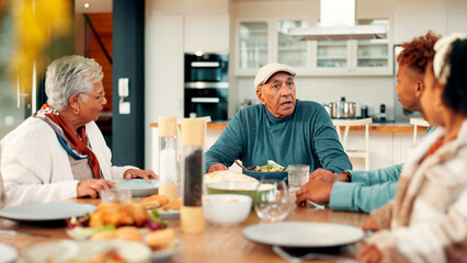 Family dinner, senior man and talking in home for social gathering, holiday celebration or support. Love, people and old person with lunch party at dining table for festive reunion, bonding and chat