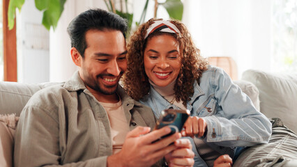 Couple, relax and smile on sofa with phone for social media, online communication and connection....
