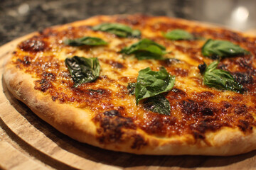 Delicious homemade pizza with fresh basil leaves ready to be served on a wooden board, perfect for a cozy dinner or a food blog post, inviting and appetizing
