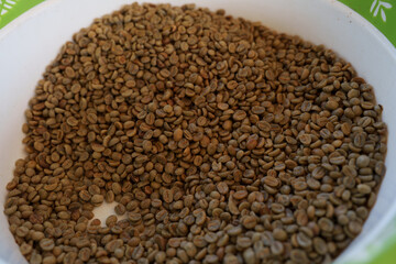 Close-up of coffee beans going through the drying and roasting process