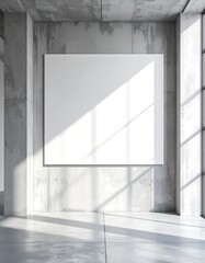 Obraz premium Modern minimalist concrete interior with a large blank canvas illuminated by dramatic sunlight and shadows.