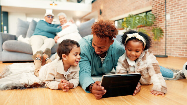 Happy family, father and children with tablet on floor for entertainment, movie or education in home. Dad, kids or siblings with smile, technology or learning for app, interaction or bonding in house
