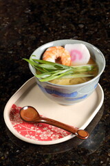 Chawanmushi is a Japanese egg-based dish that pairs well with cold temperatures. It includes shiitake and shimeji mushrooms, truffle oil, and chicken breast.