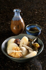 Oden, a Japanese stew with white daikon radish, potatoes, kombu seaweed, eggs, konnyaku, fried tofu, chikuwa, kamaboko, yam, and carrot.