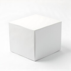 Naklejka premium Simple white cube isolated on white background, a blank canvas for design and concepts