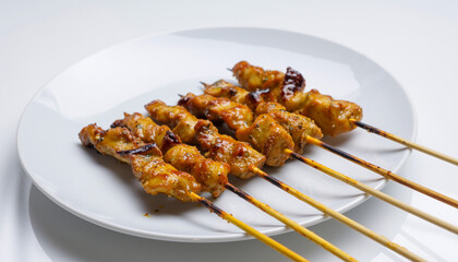 grilled chicken breast with vegetables. Indonesian satay chicken. Sate Indonesia.	