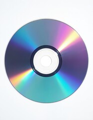 Round shiny cd disc reflects rainbow colors. Compact disc sits alone on clean white background. Shiny circle reflects light, showing spectrum.