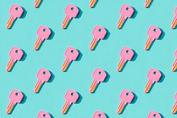 Top-down flatlay of repeating key cards on pastel blue background with subtle shadows and soft diffused light, showcasing minimalist design and clean card edges.