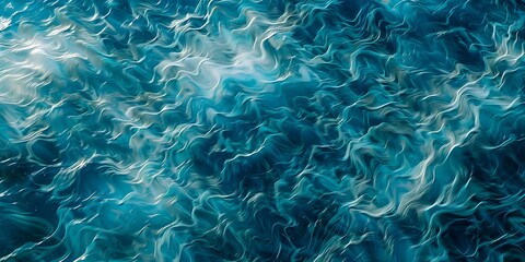 Deep blue ocean waves with shimmering sunlight, creating a mesmerizing abstract pattern.