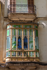 Old apartment house with a ornamental bay window