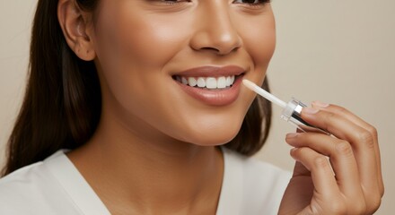 Woman applying lip gloss on her lips. Beauty routine concept for makeup, skincare and cosmetic product. Daily female glamour.