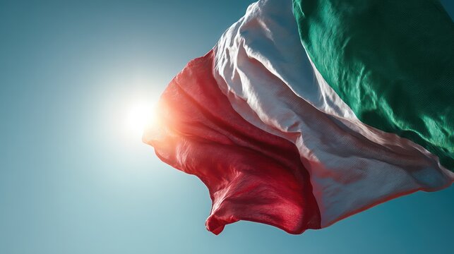 A fluttering Italy flag captured mid-air, fabric edges showing subtle motion blur while central stripes remain sharp. Sunlight - Powered by Adobe