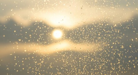 Water droplets on glass with blurred sunlight