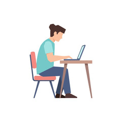 A person is seated at a desk, typing on a laptop computer.