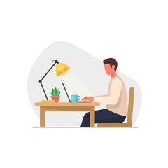 A person working on a laptop at a desk, illuminated by a lamp.