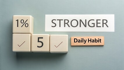 Cubes with text showing daily habits for becoming stronger