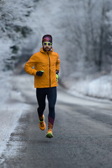 Man runs on icy road