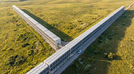 Aerial perspective of a sprawling laser interferometer, a landmark of modern physics for gravitational wave detection and astrophysics research