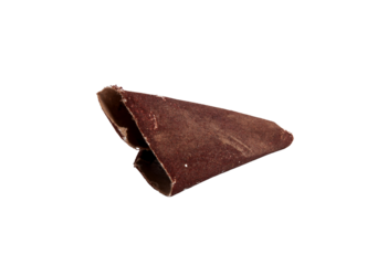 Detailed view of curled brown sandpaper , rough texture.