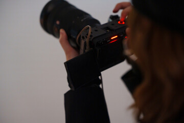 Finding the perfect shot while holding a camera