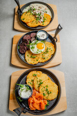 Plates of delicious brunch featuring savory dishes with eggs, smoked salmon, and vegetables