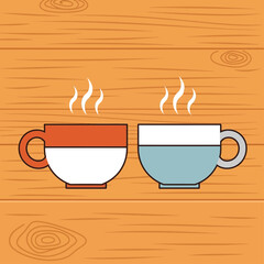 Two steaming mugs of coffee or tea, one red and white, the other blue and white, on a wooden surface.