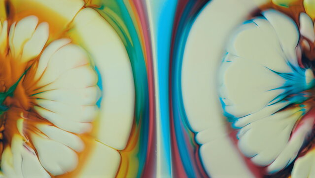 Luminous fluid art showcasing symmetrical vibrant colorful patterns