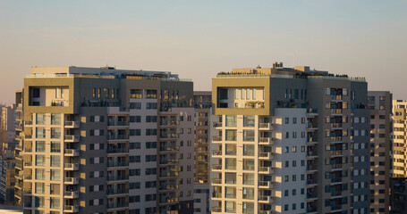 Obraz premium Residential blocks featuring balconies and terraces in urban environment