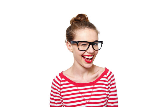 Portrait, woman and winking with glasses in studio for flirty expression of playful personality. Person, smile and gesture for fun mood, secret interest and sign of hidden message on white background