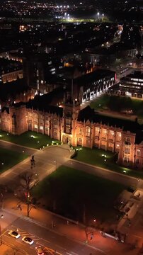 Social ratio vertical aerial video of the Lanyon building at Queen's University on a calm night. Produced in 1080x1920 and with Rec709 color.