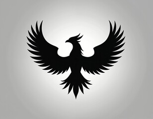Obraz premium Black silhouette of a phoenix bird with spread wings. Mythical creature emblem represents rebirth, strength, and resilience. Its bold design is ideal for logos and brand identity.