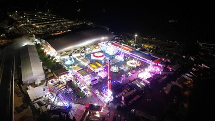 Aerial night view of illuminated amusement park in Portugal