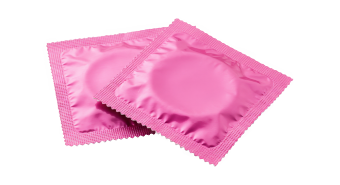 Pair of pink condom wrappers overlapping on a transparent background for safe sex