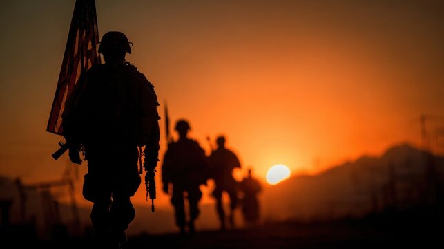 Silhouettes soldiers USA flag against sunset military heroic patriotic honor