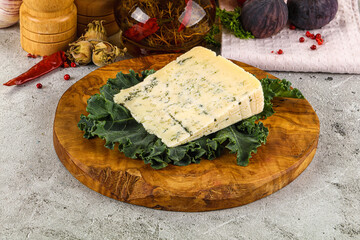 Blue cheese piece over board