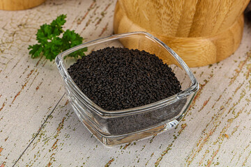 Black dry Nigella seeds in the bowl