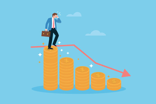 Worried businessman observing financial decline on coin stacks