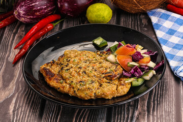 Tasty chicken steak with vegetables