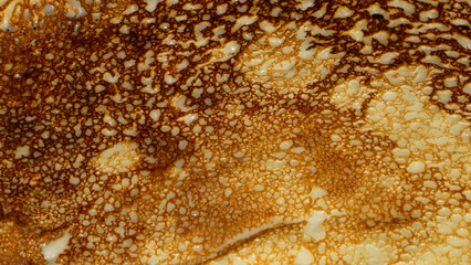 Abstract Macro Texture of Golden Pancake Surface