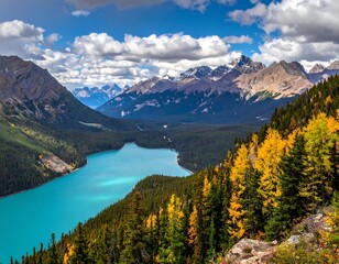 Turquoise lake nestled in a valley with pine and golden trees.