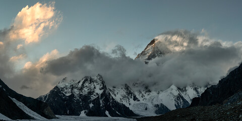 K2 mountain peak covered with clouds and snow in the Karakorum Pakistan
