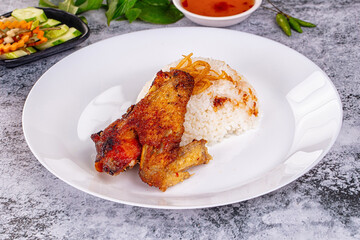 Spicy roasted chicken wing with rice