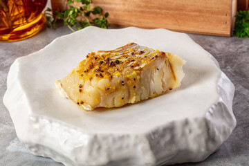 Steamed cod fish fillet with spices